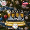 Ornament of four Steelers legends standing in uniform with names and numbers visible, placed against a city skyline on a Christmas tree.