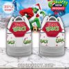 Christmas themed sneakers showing Team Grinch text and festive heel design.