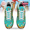 Top view of sneakers featuring Scooby-Doo in Santa hat and scattered holiday elements across the toe box!