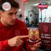 A gym-goer highlights a special edition whiskey glass for the 119th anniversary of St. John’s Red Storm, capturing a casual, lifestyle-focused product moment!