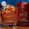 Cardinals whiskey glass with amber drink and red gift box on table!