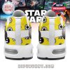 Rear profile shows twin sneaker backs with white midsoles and signature yellow upper detailing!