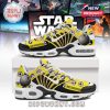 Vivid product shot of yellow Star Wars shoes with curved side overlays and galactic theme logos!