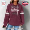 Female model wearing maroon Texas A&M Aggies hoodie with classic team text and pocket front!