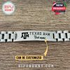 Stainless steel Texas A&M bracelet with engraved logo and customizable name displayed on a wooden surface.