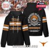 Black hoodie with orange Texas Longhorns logo and skull-themed fan design. Ideal for passionate supporters of the team.