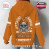 Back-only shot of orange Texas Longhorns hoodie showcasing fan slogan and edgy football artwork.