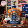 A commemorative bottle for The Swamp displayed with Florida Gators memorabilia, including signed helmets and footballs.