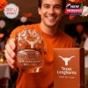 Texas Longhorns whiskey glass held forward by a fan with team themed box and festive atmosphere!