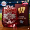 Commemorative Wisconsin Badgers whiskey glass with red drink and detailed team graphics beside a red box marked with a gold W and Badger State Pride slogan, all staged in a stadium environment!
