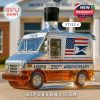 A USPS 250th Anniversary whiskey bottle shaped like a postal truck with a simple black cap.