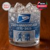 A detailed close up of the United States Postal Service 250th anniversary whiskey glass showing postal themed engravings and stamp artwork!