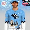 Man wearing an Anaheim Ducks Bluey Night hockey jersey in light blue with cartoon characters and official team logo!