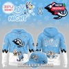 Matching light blue hoodie and cap with cartoon dogs playing hockey, large mammoth logo, paw prints, and playful winter theme!