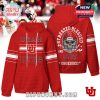 A red sports-themed hoodie with white accents, UTAH UTES text on front, and a skull in a football helmet on back with 