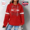 Front view of red Utah Utes women’s hoodie featuring team logo and striped sleeves for a sporty and stylish fan look!