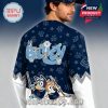 Back of the jersey with Bluey branding, show characters, and hockey-themed Bluey and Bingo illustrations on a navy background with white sleeves!