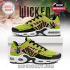 Limited edition Wicked sneakers with signature green-pink color blocking, custom name print, and character motifs on each heel!