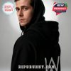 Profile of a man in a black hoodie with Alan Walker's logo on the back, showcasing a simple yet striking design.