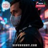 Alan Walker in the **Walkerworld Tour hoodie**, walking through a lit urban street with neon lights.