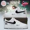 Custom white Nike sneakers with black accents and signature, featuring a 'Walker World' tour backdrop.