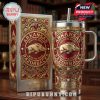 This premium tumbler set features the Arkansas Razorbacks mascot and school branding in a rich burgundy and gold design. Intricate 3D carvings, jewel-like red accents, and detailed lettering make it both decorative and functional!