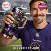 Fan holding up a purple Baltimore Ravens YETI tumbler celebrating 30 years, with commemorative gold and team detailing!