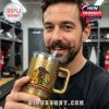 Man drinking from a Chicago Blackhawks gold anniversary tumbler in a team locker room environment!