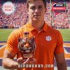 Man holding Clemson Tigers tiger whiskey bottle on a football field!