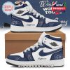 Navy and white high top sneaker with custom name printed on the side signature style graphics and clean modern design.