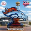 Close-up of the Denver Broncos collectible bottle in the shape of a horse with a golden crown and the team's logo at the base.