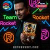 A man poses with a Pokémon anniversary glass in front of glowing neon Team Rocket symbols!