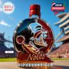 Noles round whiskey bottle with red cap and detailed emblem design on stadium background!