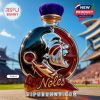 Noles round whiskey bottle with purple cap and refined emblem design in stadium setting!