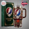 Grateful Dead 40oz tumbler, stainless steel, double-walled insulation, iconic logo. Keeps drinks cold/hot for hours.