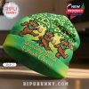 Green beanie featuring dancing bears with Irish hats holding beer mugs, shamrock tree, and 