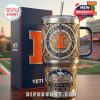 Outdoor shot of Illinois tumbler and packaging with college stadium backdrop.