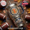 Top-down view of Illinois Fighting Illini tumbler with football accessories and autumn decor.