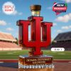 Red university symbol perfume bottle with wooden cap standing on a sports field background!