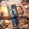 Hand holding a Kenny Chesney I Go Back 26 YETI tumbler with beach and sunset background, evoking country music and tropical vibes.