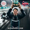 Formula 1 driver raises a commemorative whiskey glass with Mercedes AMG PETRONAS branding on a rainy, lit-up track with a race car behind!
