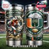Two sides of Miami Hurricanes tumblers on football field.
