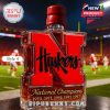 Nebraska Huskers red letter whiskey bottle with black stopper in stadium!