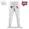 A pair of white sweatpants with an “Allstate Sugar Bowl” patch on the left thigh and bold red “Ole Miss” text on the right thigh, representing the 2026 champions!
