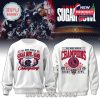 White sweatshirt commemorating the Ole Miss Rebels’ 2026 Sugar Bowl Championship, with bold text and graphics.