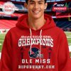 A young man in a red hoodie that features a sports design with the Allstate Sugar Bowl logo, marking Ole Miss as the 2026 champions.
