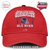 A red cap featuring the Allstate Sugar Bowl Champions 2026 logo with Ole Miss branding, celebrating the victory.