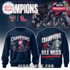 Navy blue Ole Miss sweater with front mascot design and back trophy and helmet layout, marking 2026 Sugar Bowl championship!