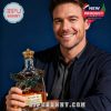 Man holding an eagle shaped decorative bottle with a premium brand look and elegant background!