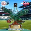 Eagle shaped bottle with black cap displayed on a football stadium field!